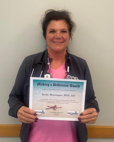 Kelly Meisinger honored with Making a Difference Award 